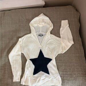 Elegant White V-Neck Sweater with Black Star